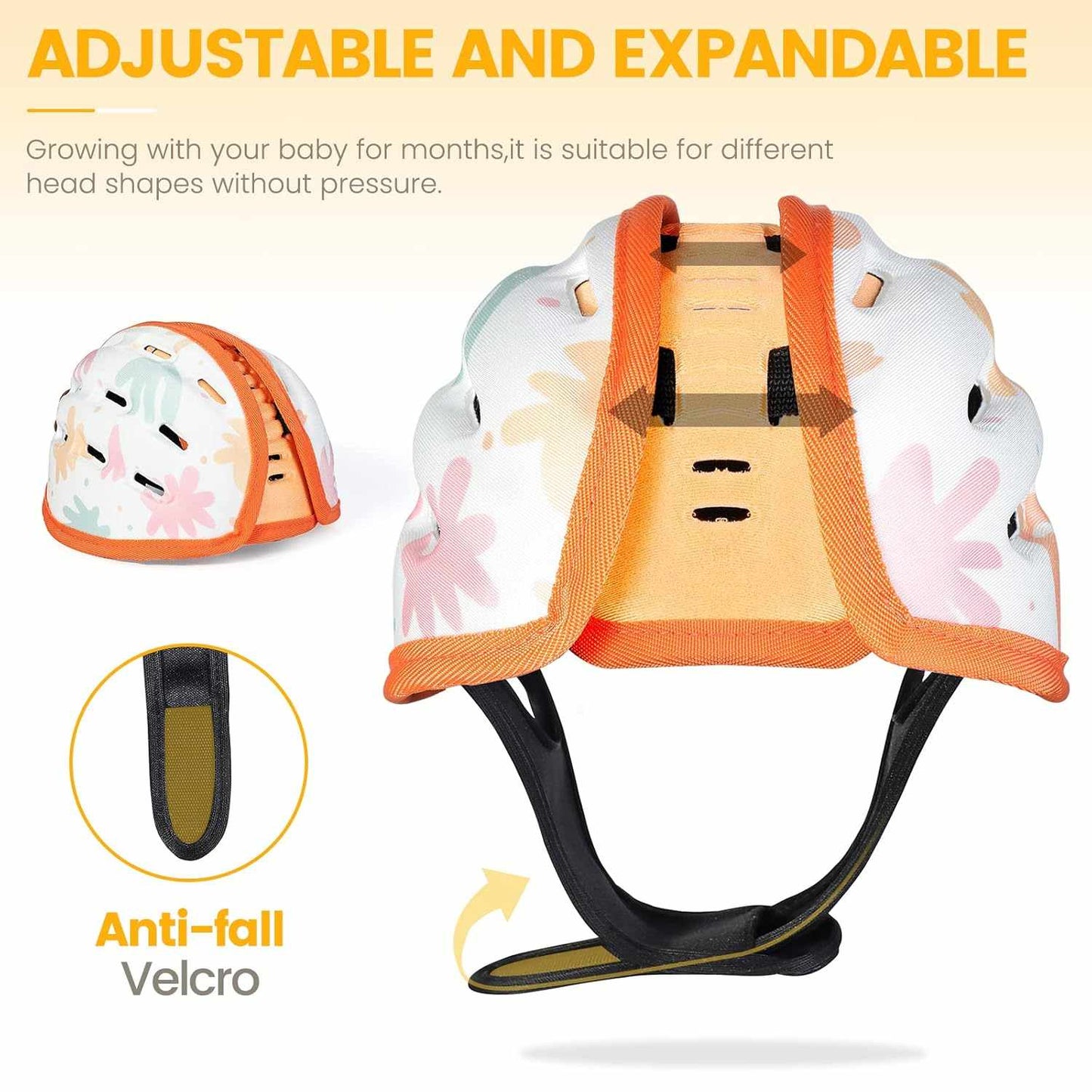 Baby helmet with floral design and adjustable straps on a white background