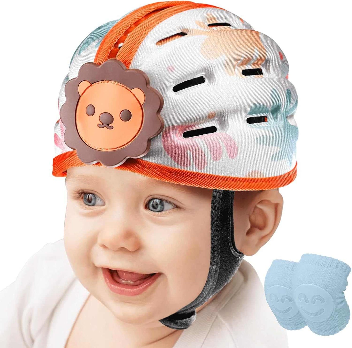 Baby wearing a colorful helmet with a lion design and a small blue cast on the side.