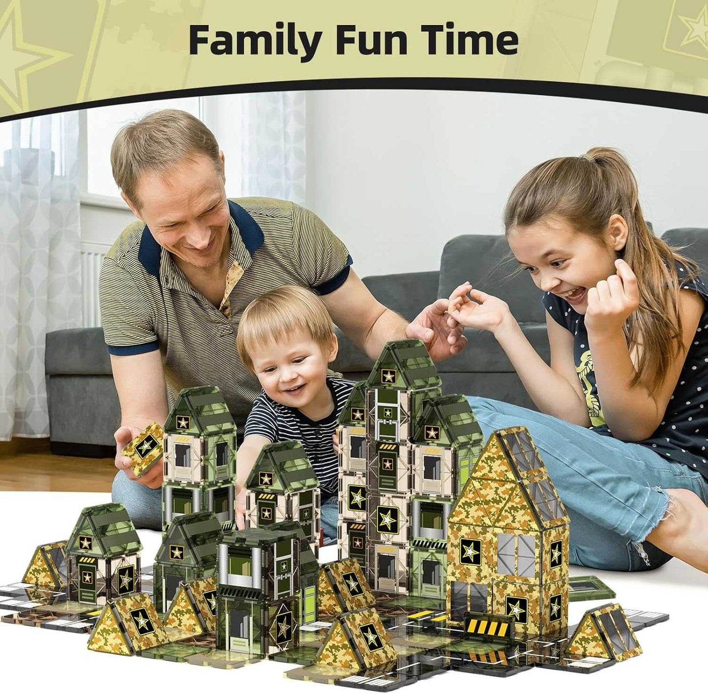 Family playing with a model building set on a table, with a neutral background.