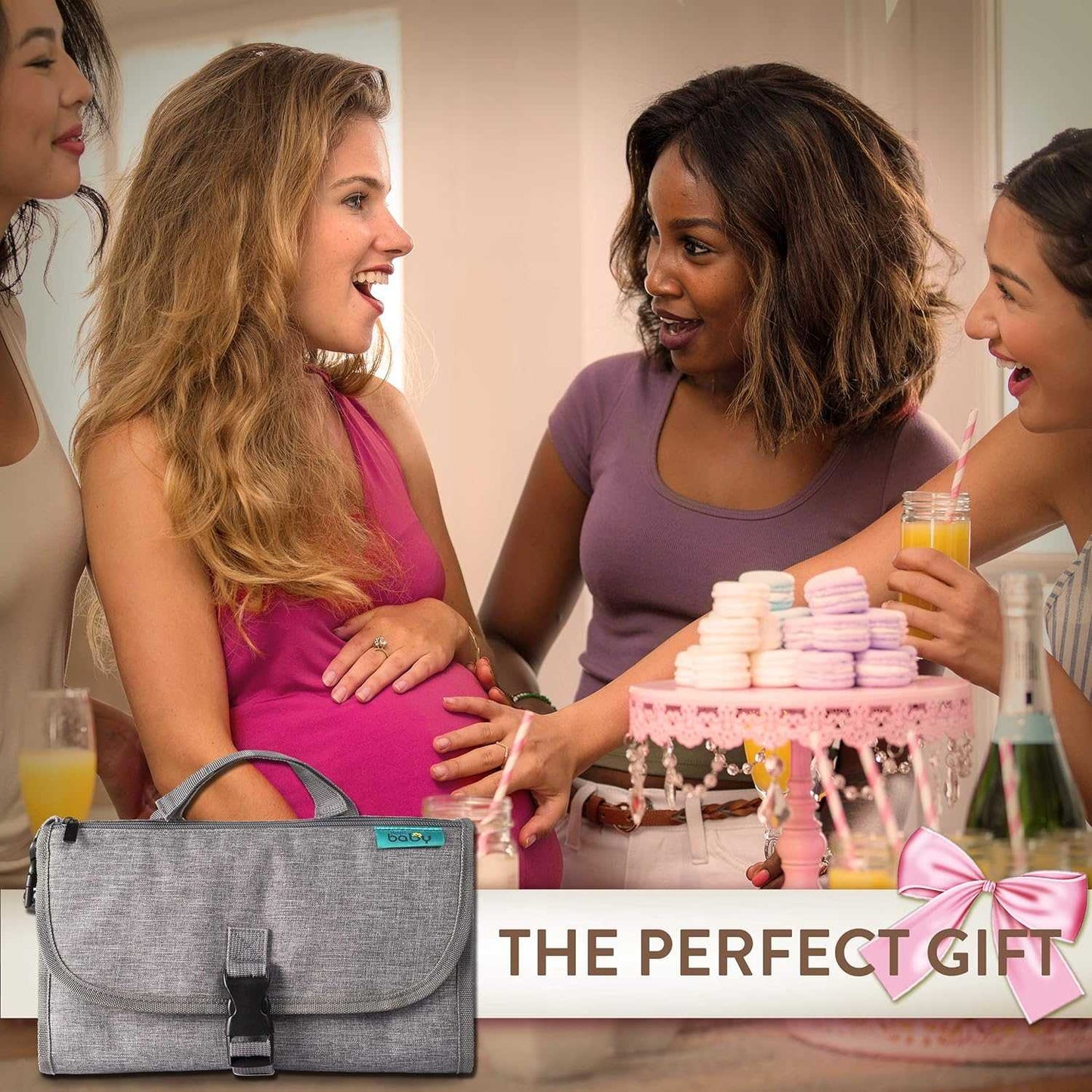 Pregnant woman with a gray bag at a baby shower with other women.