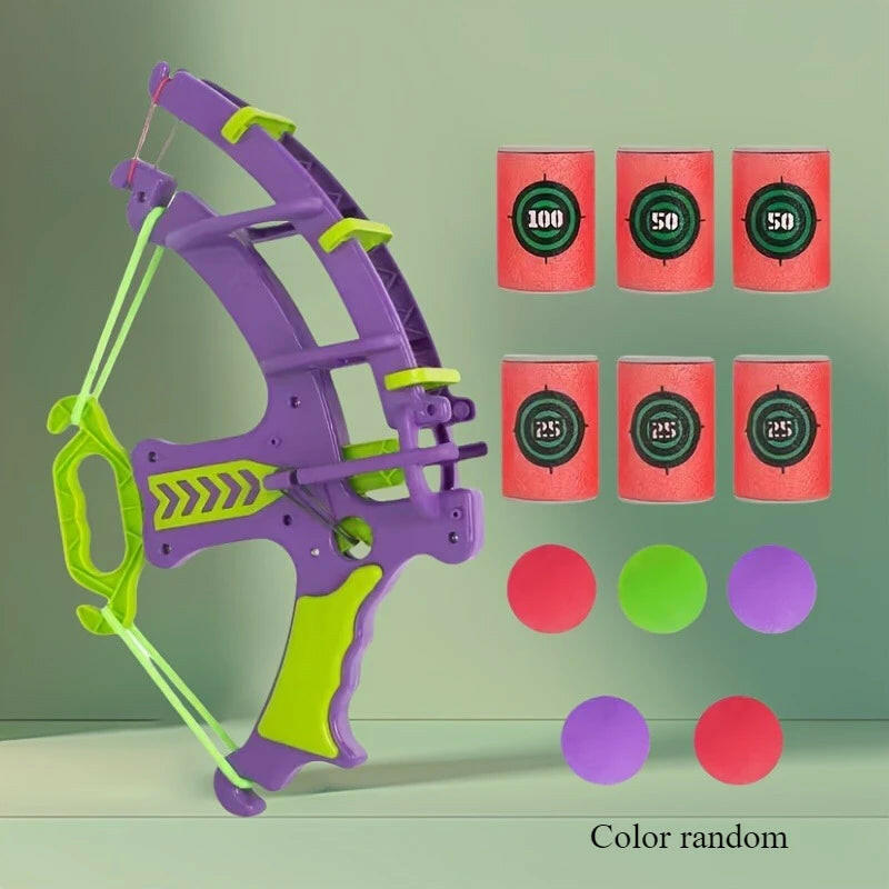Toy bow and arrow set with colorful targets on a green background