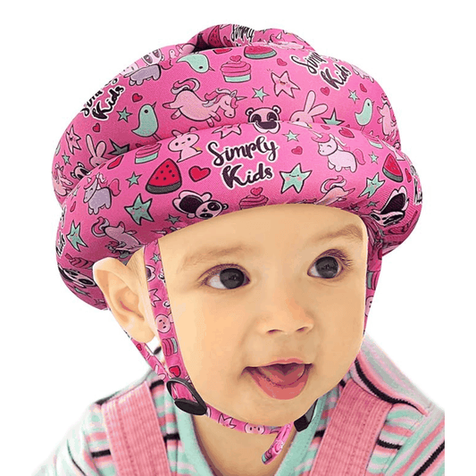 Baby wearing Baby Safety Helmet Pink Pattern Design with full head protection while crawling
