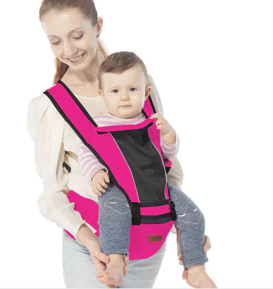 mother carrying baby in ergonomic summer baby carrier waist stool in pink and black