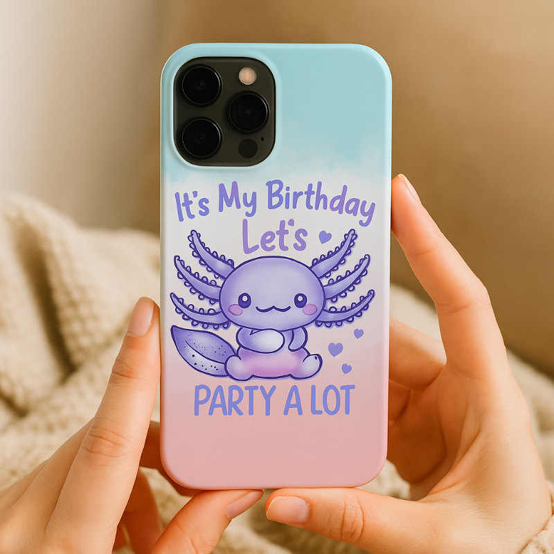 Phone case with a cute axolotl design and text 'It's My Birthday Let's Party A Lot' held by hands.