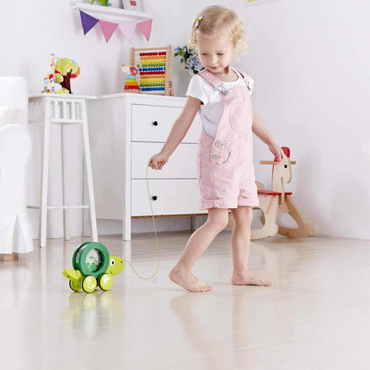 Colorful wooden pull along toys for toddlers with animal designs promoting early walking and sensory play