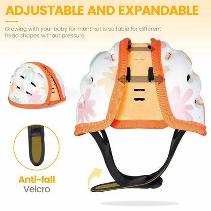 Baby helmet with floral design and adjustable straps on a white background