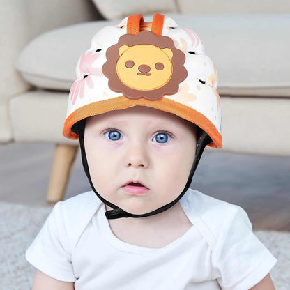 Baby wearing a lion-themed helmet indoors