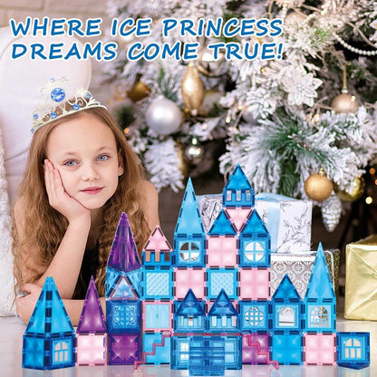 Girl with crown playing with colorful Ice Princess Castle Magnetic Tiles building set by decorated Christmas tree