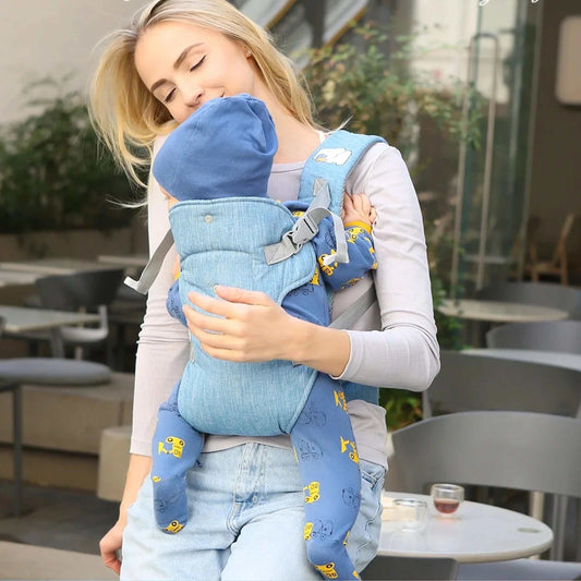 Mother holding her baby in a blue Infant Baby Carrier with adjustable straps, providing ergonomic support and comfort during outdoor use.