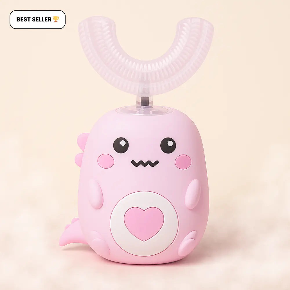 Pink cartoon-like device with a heart on a light pink background SWEVVA™ DinoBrush 360° U-Shaped Kids Toothbrush