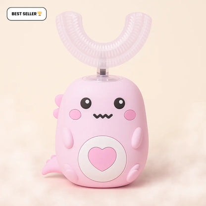 Pink cartoon-like device with a heart on a light pink background SWEVVA™ DinoBrush 360° U-Shaped Kids Toothbrush