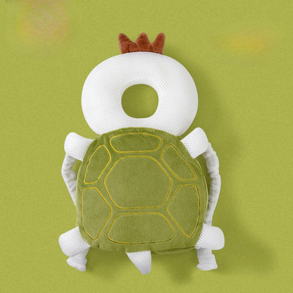 Plush turtle toy with a white ring on a green background