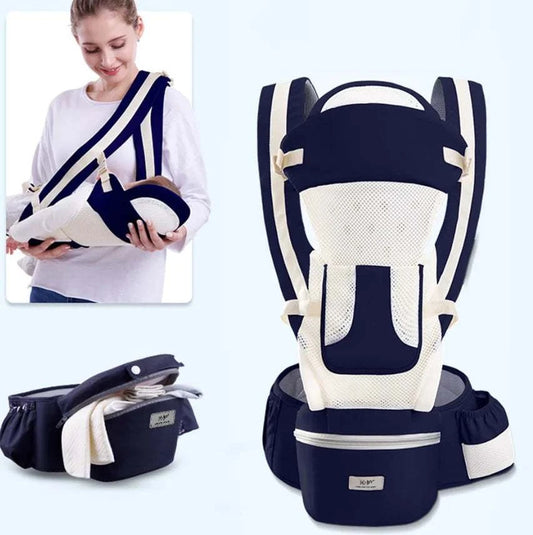 Navy and white baby carrier with packaging and a person using it.