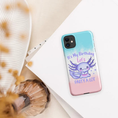 Phone case with a birthday design featuring a purple creature and text on a gradient background.